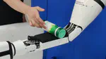 A Robust Model Predictive Controller for Tactile Servoing